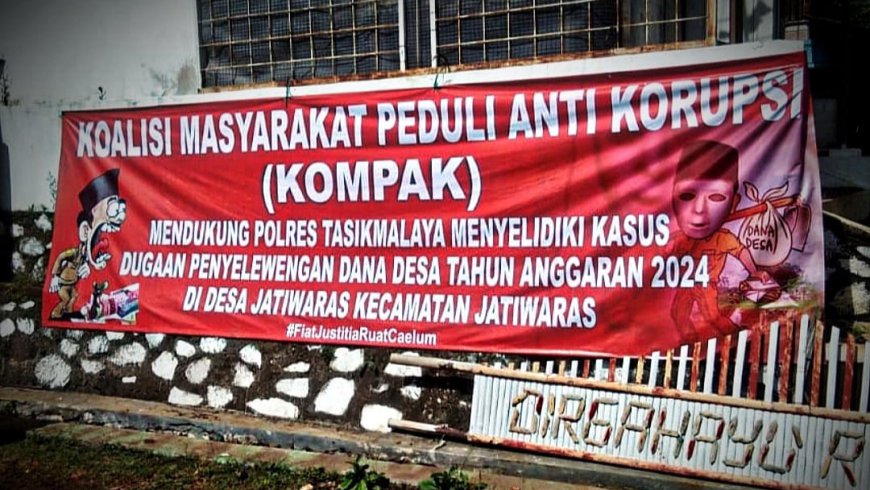 Spanduk Dukung APH Usut Tuntas Dugaan Penyelewengan Dana Desa Jatiwaras Raib